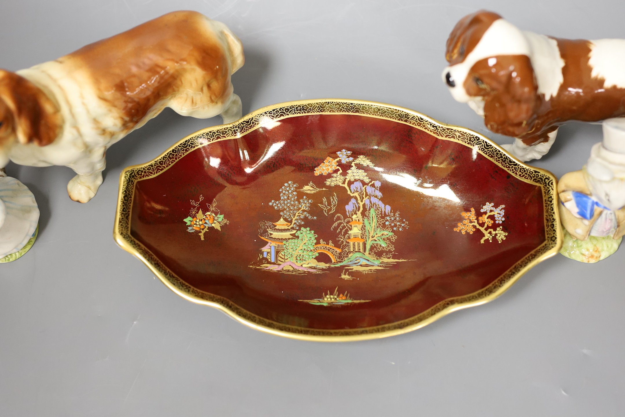 Five items of Beswick including three Beatrix Potter figures together with Crown Devon Rouge royal tray